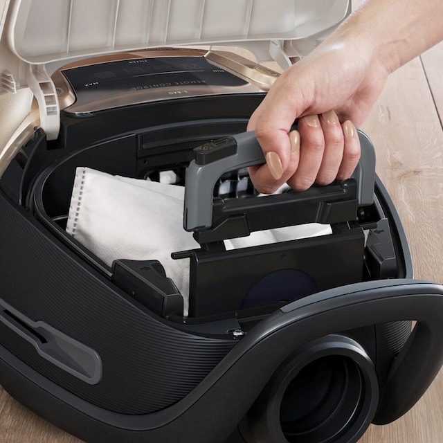 Hygieniskt byte av dammsugarpåsen